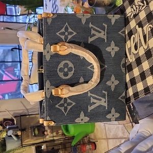 Lv same as last picture blue material inside blue suede pocket key size above